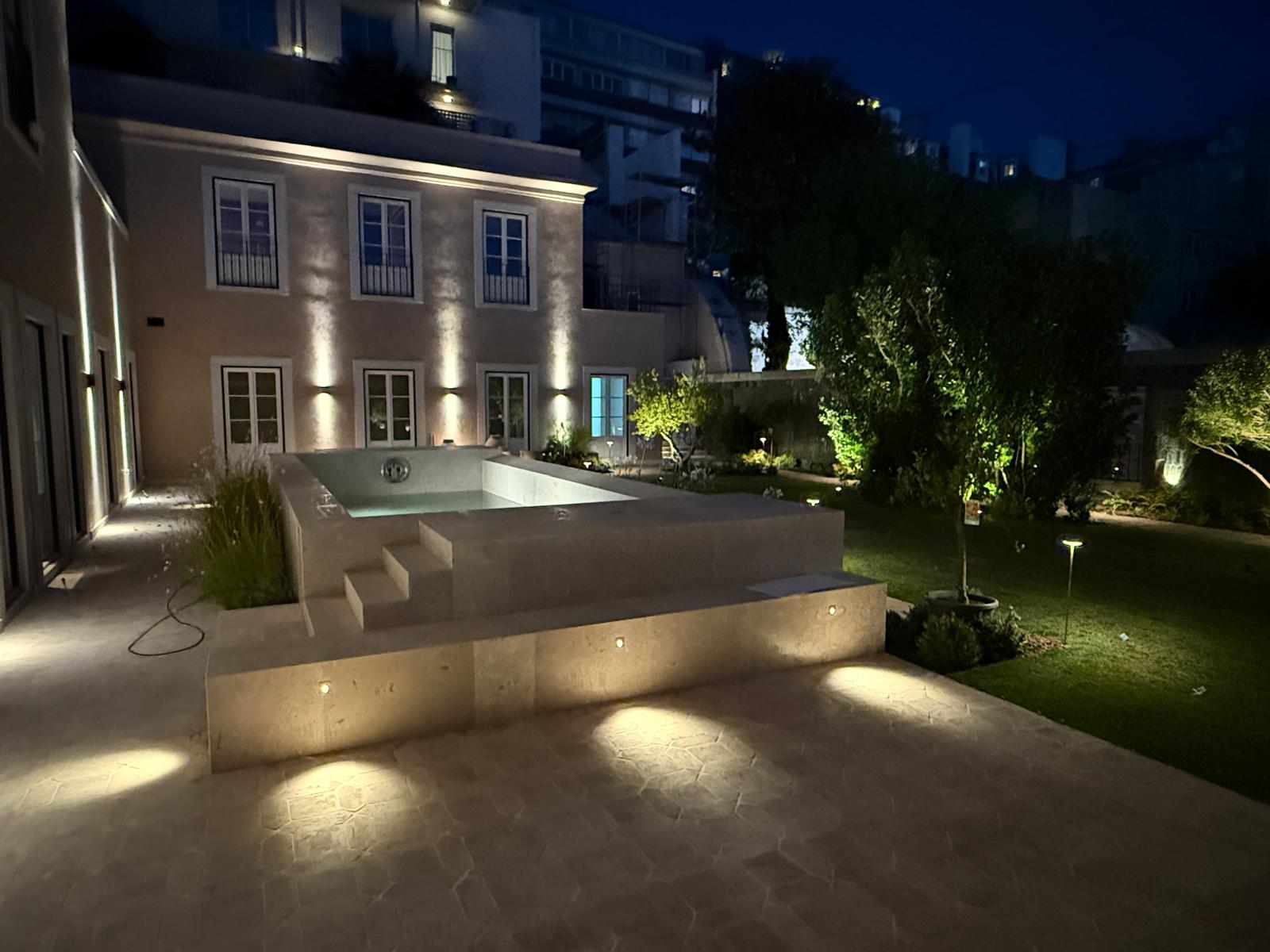 A house and its front steps lit at dusk