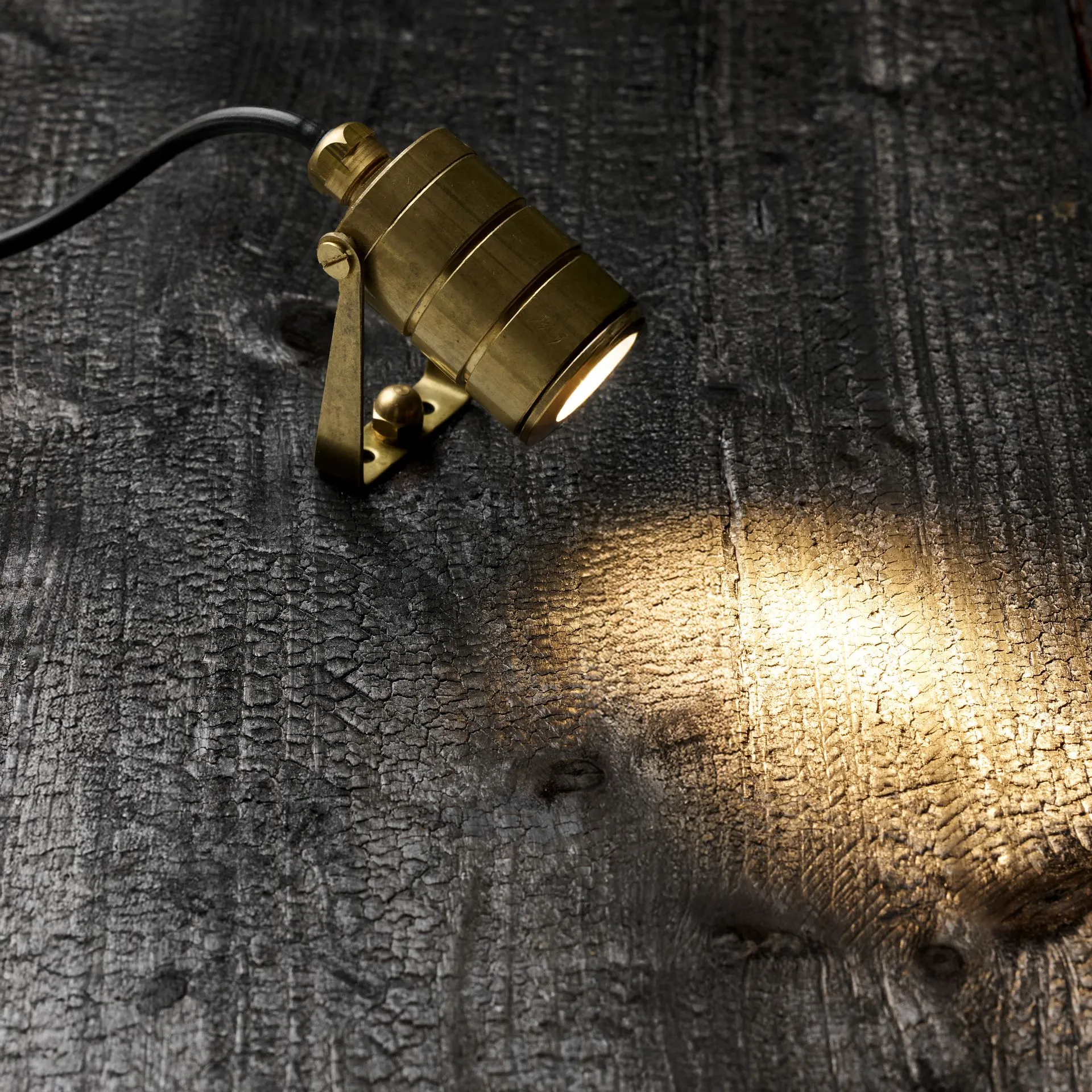 Zapa Shoot Yoke, solid brass, on burnt wood, photo 1